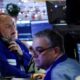 Wall St hovers near all-time highs in light, post-holiday session