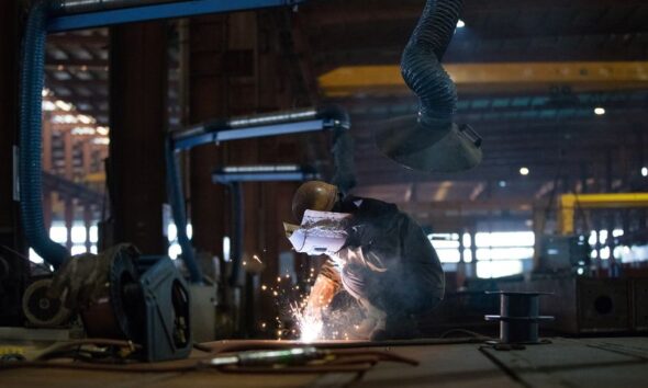 China’s factory activity returns to growth in December