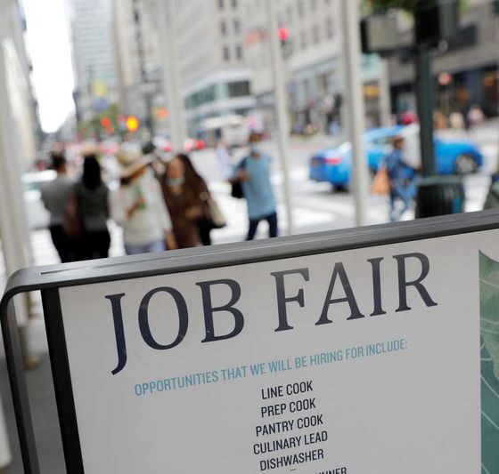 US jobless claims slide to cap a bumpy year for job market