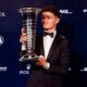 Lando Norris receives F1 world championship trophy at FIA gala in Uzbekistan