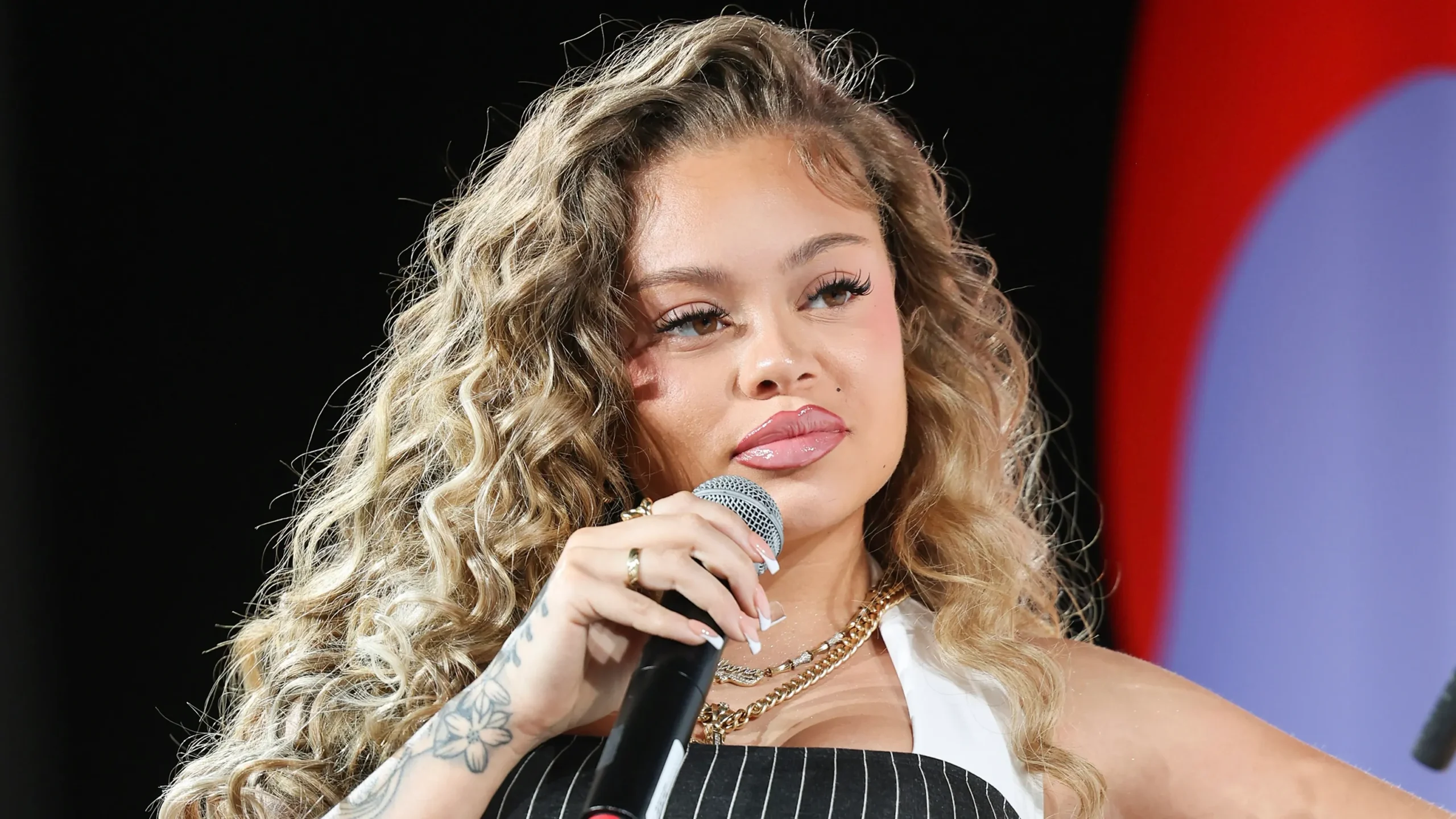 Latto Seemingly Reacts After Woman Goes Viral For Saying She's The Rapper's Estranged Half-Sister (WATCH)