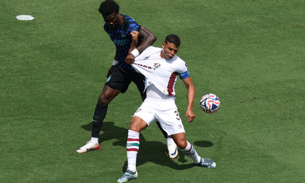 CHARLOTTE, NORTH CAROLINA - JUNE 30: Thiago Silva #3 of Fluminense FC is challenged by Marcus Thuram #9 of FC Internazionale Milano during the FIFA Club World Cup 2025 round of 16 match between FC Internazionale Milano and Fluminense FC at Bank of America Stadium on June 30, 2025 in Charlotte, North Carolina. (Photo by Buda Mendes/Getty Images)