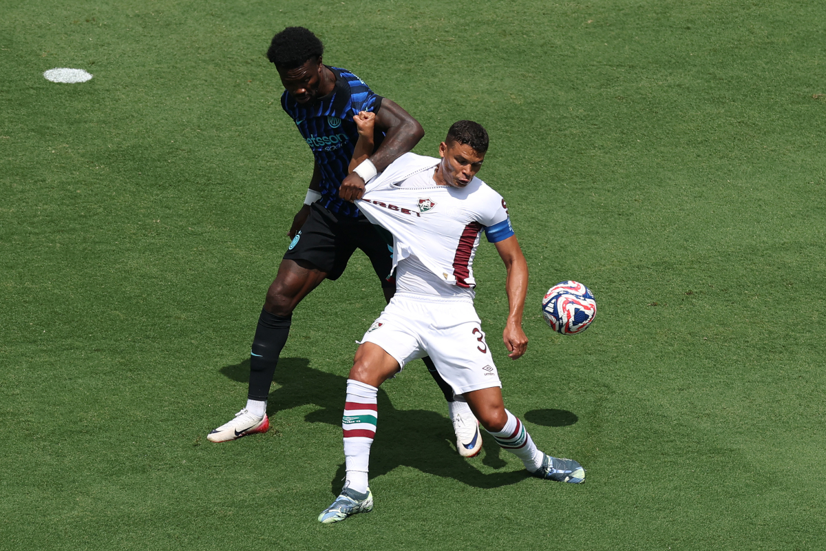 CHARLOTTE, NORTH CAROLINA - JUNE 30: Thiago Silva #3 of Fluminense FC is challenged by Marcus Thuram #9 of FC Internazionale Milano during the FIFA Club World Cup 2025 round of 16 match between FC Internazionale Milano and Fluminense FC at Bank of America Stadium on June 30, 2025 in Charlotte, North Carolina. (Photo by Buda Mendes/Getty Images)