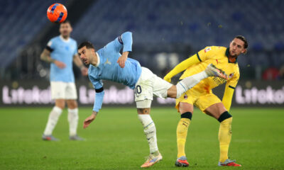 ROME, ITALY - DECEMBER 04: Mattia Zaccagni of Lazio is challenged by Adrien Rabiot of AC Milan during the Coppa Italia Round of 16 match between SS Lazio and AC Milan at Olimpico Stadium on December 04, 2025 in Rome, Italy. (Photo by Paolo Bruno/Getty Images)