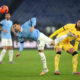 ROME, ITALY - DECEMBER 04: Mattia Zaccagni of Lazio is challenged by Adrien Rabiot of AC Milan during the Coppa Italia Round of 16 match between SS Lazio and AC Milan at Olimpico Stadium on December 04, 2025 in Rome, Italy. (Photo by Paolo Bruno/Getty Images)