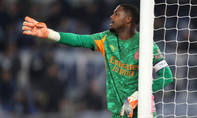 ROME, ITALY - DECEMBER 04: Mike Maignan of AC Milan gives the team instructions during the Coppa Italia Round of 16 match between SS Lazio and AC Milan at Olimpico Stadium on December 04, 2025 in Rome, Italy. (Photo by Paolo Bruno/Getty Images)