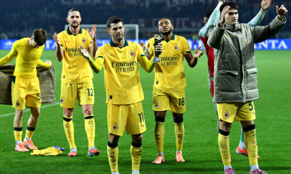 TURIN, ITALY - DECEMBER 08: Christian Pulisic of AC Milan celebrates with teammates following victory in the Serie A match between Torino FC and AC Milan at Stadio Olimpico di Torino on December 08, 2025 in Turin, Italy. (Photo by Valerio Pennicino/Getty Images)