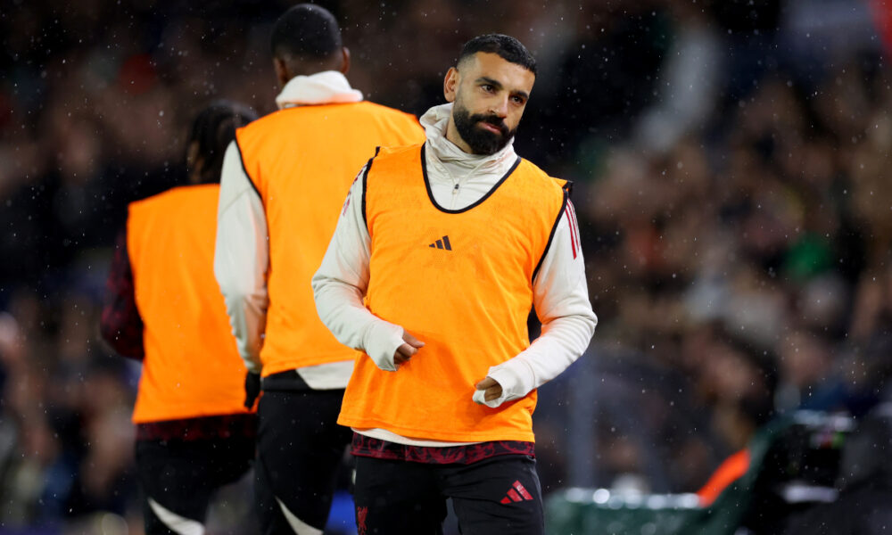 LEEDS, ENGLAND - DECEMBER 06: Mohamed Salah of Liverpool warms up as a substitute during the Premier League match between Leeds United and Liverpool at Elland Road on December 06, 2025 in Leeds, England. (Photo by Molly Darlington/Getty Images)