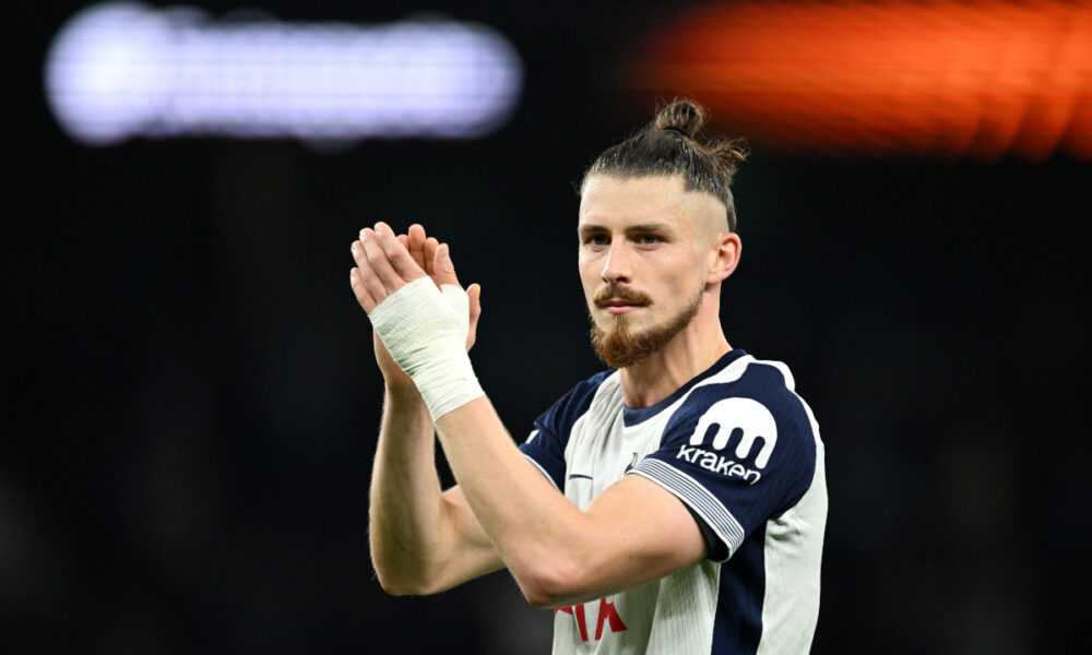 LONDON, ENGLAND - OCTOBER 24: Radu Dragusin of Tottenham Hotspur applauds the fans after the team