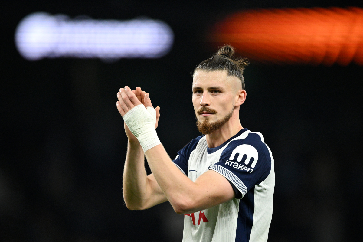 LONDON, ENGLAND - OCTOBER 24: Radu Dragusin of Tottenham Hotspur applauds the fans after the team