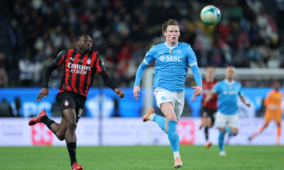 RIYADH, SAUDI ARABIA - DECEMBER 18: Scott McTominay of SSC Napoli battles for possession with Youssouf Fofana of AC Milan during the Supercoppa Italiana Semi-Final match between SSC Napoli and AC Milan at King Saud University Stadium on December 18, 2025 in Riyadh, Saudi Arabia. (Photo by Abdullah Ahmed/Getty Images)