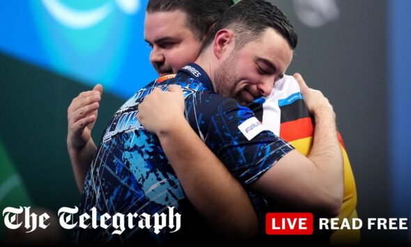 Luke Humphries survives scare to reach World Darts Championship last 16