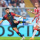 GENOA, ITALY - AUGUST 15: Valentin Carboni of Genoa (left) scores the opening goal during the Coppa Italia match between Genoa CFC and LR Vicenza at Stadio Luigi Ferraris on August 15, 2025 in Genoa, Italy. (Photo by Simone Arveda/Getty Images)