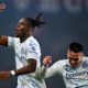 GENOA, ITALY - DECEMBER 14: Yann Bisseck of Inter (left) celebrates with his team-mate Lautaro Martinez after scoring a goal during the Serie A match between Genoa CFC and FC Internazionale at Luigi Ferraris Stadium on December 14, 2025 in Genoa, Italy. (Photo by Simone Arveda/Getty Images)