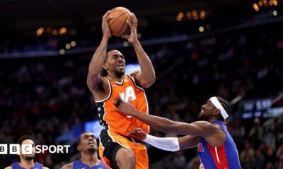 Kawhi Leonard takes a shot against the Detroit Pistons