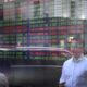 Aussie shares pare early gains but grab positive finish
