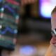 Wall St closes lower as investors position for key data