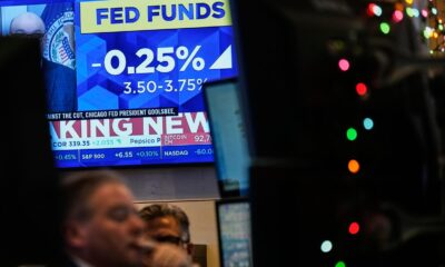 Wall Street closes higher after Fed cuts interest rates