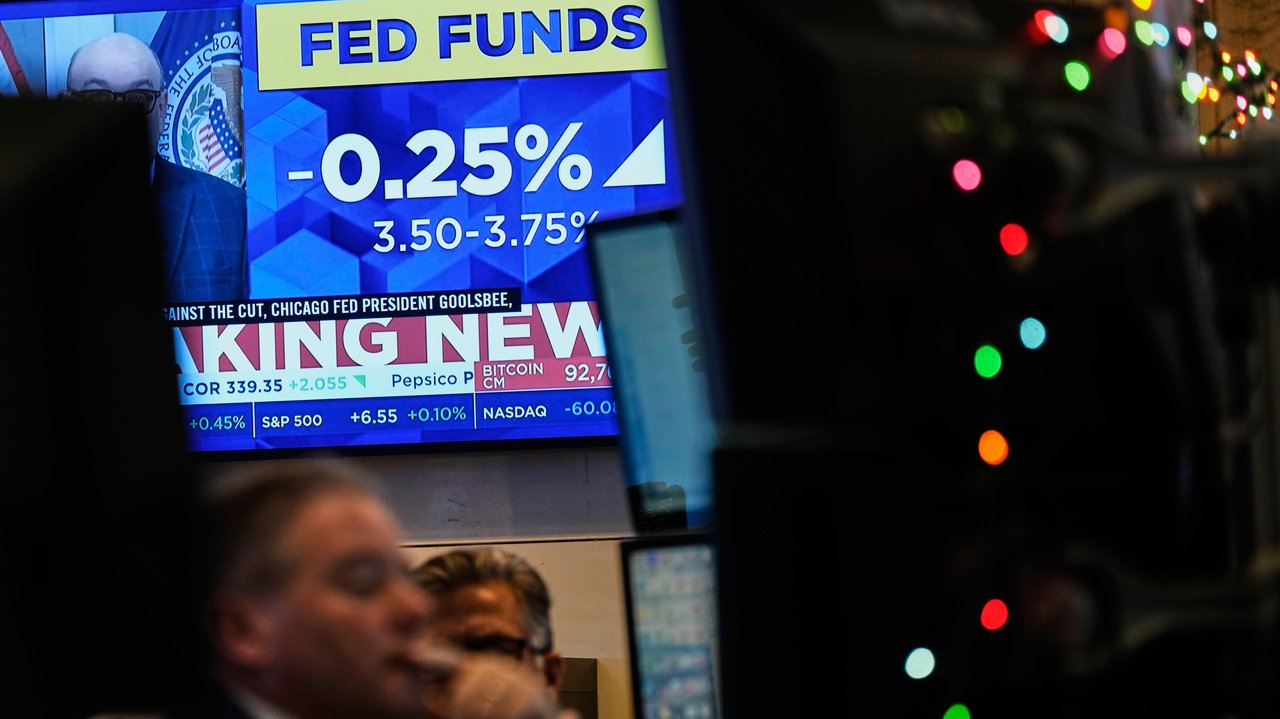 Wall Street closes higher after Fed cuts interest rates