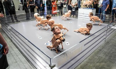 Viral robot dogs with Bezos, Musk heads poop photos at Art Basel Miami