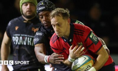 Mike Haley is tackle by Daniel Kasende