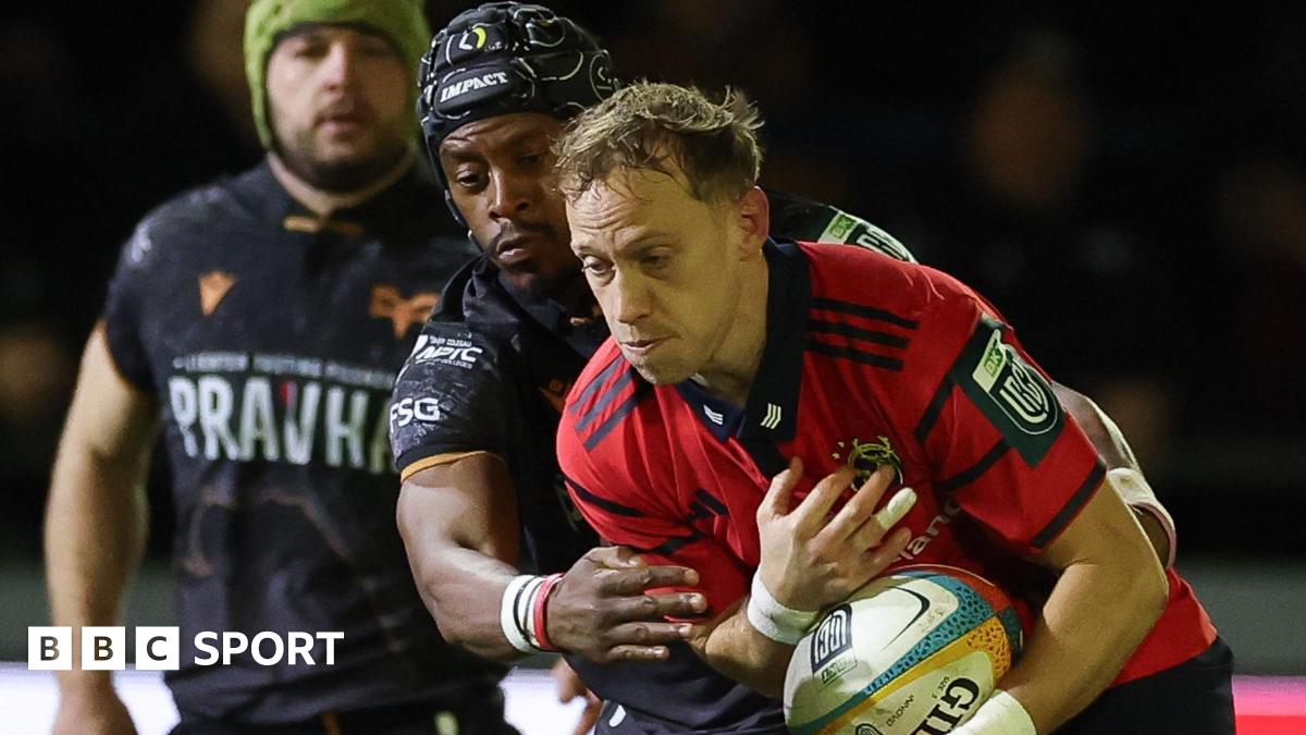 Mike Haley is tackle by Daniel Kasende