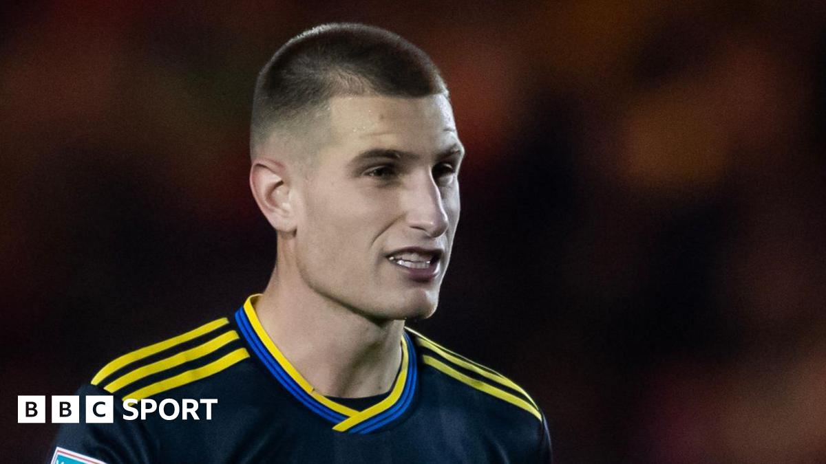 Rhys Bennett playing for Manchester United in the Vertu Trophy