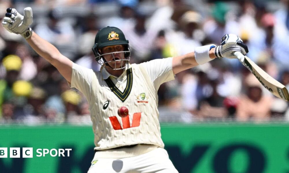Melbourne Cricket Ground head groundsman Matt Page (left) inspects the pitch during the lunch break on day two of the fourth Ashes Test