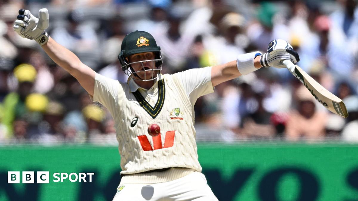 Melbourne Cricket Ground head groundsman Matt Page (left) inspects the pitch during the lunch break on day two of the fourth Ashes Test