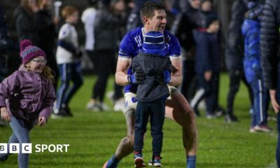 Darren Hughes celebrates with his children, Cillian and Ava