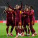 GLASGOW, SCOTLAND - DECEMBER 11: Matias Soule of AS Roma celebrates with teammates, after Liam Scales of Celtic (not pictured) concedes an own goal resulting in the first goal for AS Roma, during the UEFA Europa League 2025/26 League Phase MD6 match between Celtic FC and AS Roma at Celtic Park on December 11, 2025 in Glasgow, Scotland. (Photo by Ian MacNicol/Getty Images)