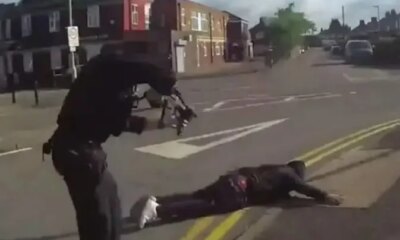 Dramatic moment armed cops swoop on 'cowardly' killer, 39, who stabbed three people as he lies face down in road