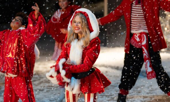 Christmas number one race sees Kylie Minogue pull further ahead of Wham! as superstar on the brink of chart history