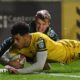 Wing Rio Dyer dives over for a try in Dragons' win against Connacht at Rodney Parade