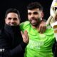 Mikel Arteta, Manager of Arsenal, and David Raya of Arsenal embrace at full-time after victory in the penalty shoot out following the UEFA Champions League 2023/24 round of 16 second leg match between Arsenal FC and FC Porto at Emirates Stadium on March 12, 2024