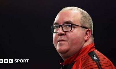 Stephen Bunting looks on