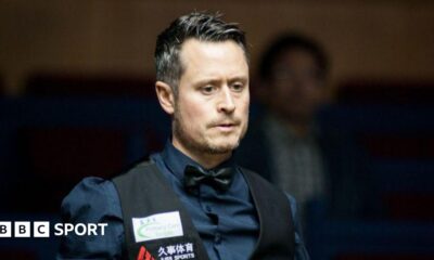 Alfie Burden wearing a waistcoat and shirt