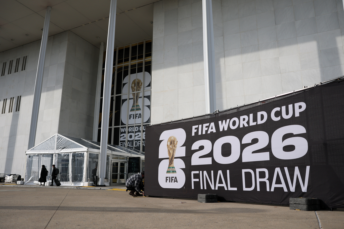 WASHINGTON, DC - DECEMBER 04: Final preparations are made as FIFA World Cup 2026 Final Draw signage is displayed outside the Kennedy Center on December 04, 2025 in Washington, DC. (Photo by Dan Mullan/Getty Images)