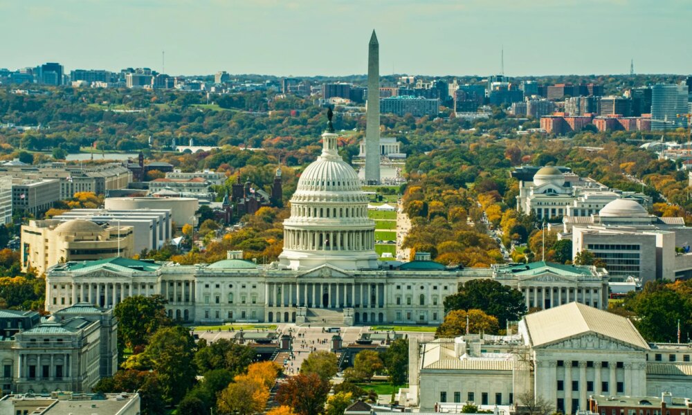Supreme Court and US Capitol Building with Washington Monument Behind in Fall - Aerial