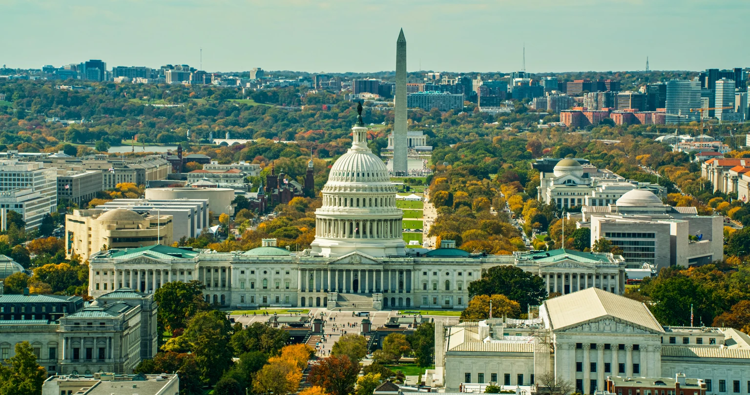 Supreme Court and US Capitol Building with Washington Monument Behind in Fall - Aerial