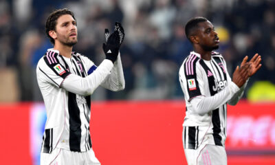 TURIN, ITALY - DECEMBER 02: Manuel Locatelli (L) and Pierre Kalulu of Juventus acknowledge the fans after victory in the Coppa Italia match between Udinese Calcio and Juventus at Allianz Stadium on December 02, 2025 in Turin, Italy. (Photo by Valerio Pennicino/Getty Images)