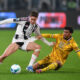 TURIN, ITALY - OCTOBER 29: Kenan Yildiz of Juventus FC is tackled by Arthur Atta of Udinese Calcio during the Serie A match between Juventus FC and Udinese Calcio at on October 29, 2025 in Turin, Italy. (Photo by Valerio Pennicino/Getty Images)