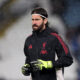 LEEDS, ENGLAND - DECEMBER 06: Alisson Becker of Liverpool warms up prior to the Premier League match between Leeds United and Liverpool at Elland Road on December 06, 2025 in Leeds, England. (Photo by Alex Livesey/Getty Images) (Salah)