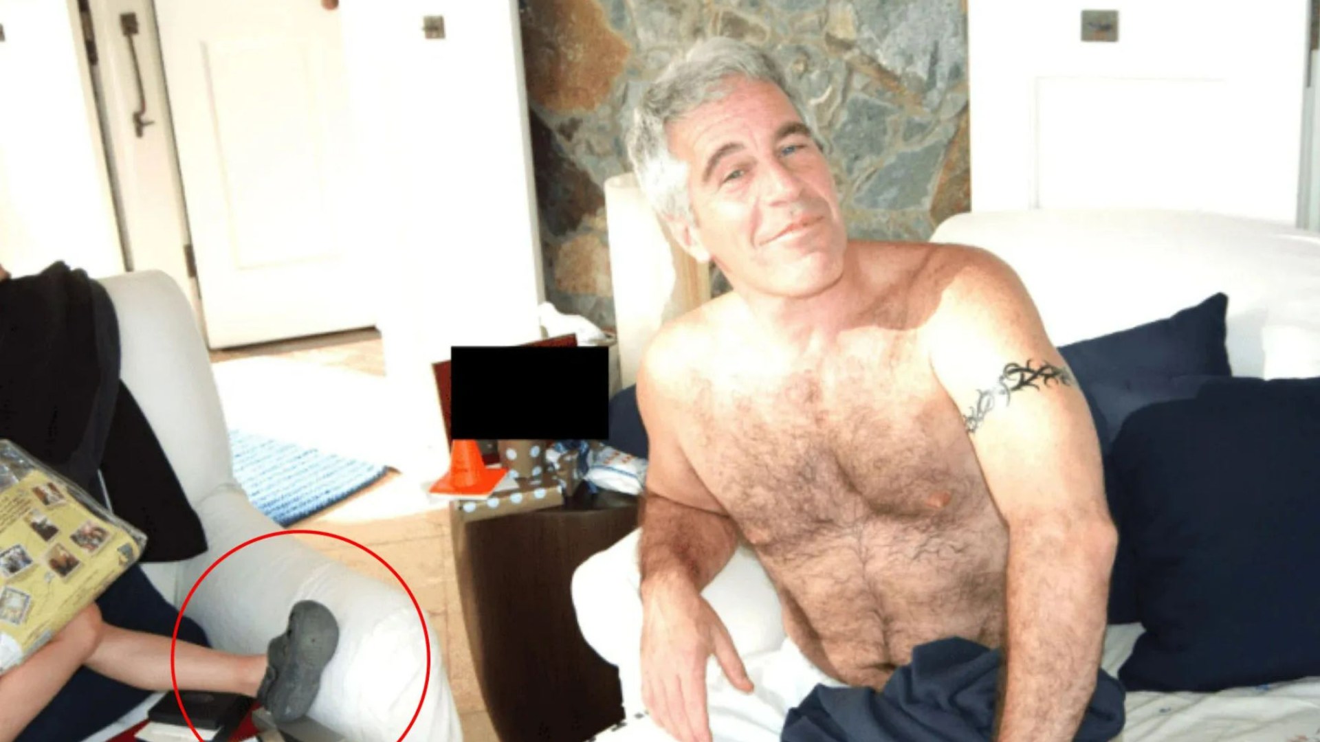 Shocking photos show 'toddler's foot' with half-naked Jeffrey Epstein at paedo island home in bombshell new files