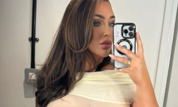 Lauren Goodger shows off very racy Christmas party look as she goes braless in sheer white dress