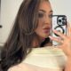 Lauren Goodger shows off very racy Christmas party look as she goes braless in sheer white dress