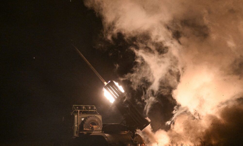 Service members of the 152nd Jaeger Brigade fire a BM-21 Grad multiple rocket launch system. Pic: Reuters