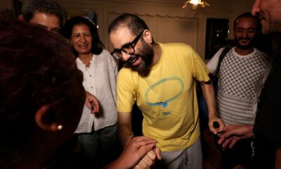 Alaa Abd El-Fattah with his family in Egypt after his prison release in September. Pic: Reuters