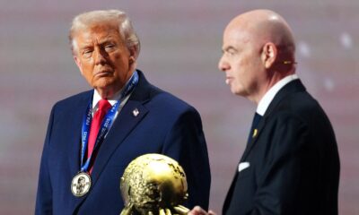 US President Donald Trump receives the FIFA Peace Prize. Pic: Reuters