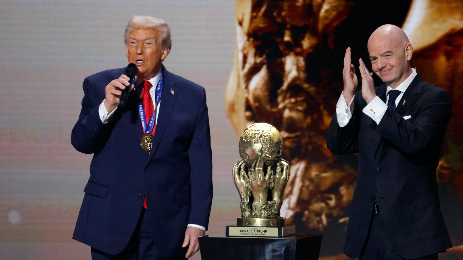 Donald Trump and FIFA president Gianni Infantino. Pic: Reuters